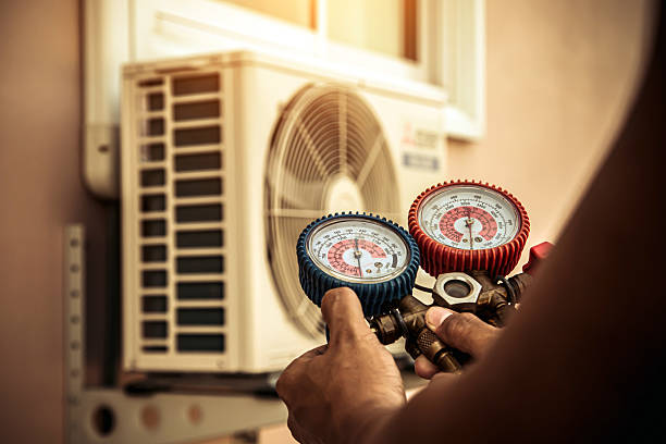 Professional Air Conditioning Service technician working in Houston, DE